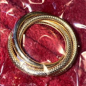 Gold tone double ring spiral pin brooch